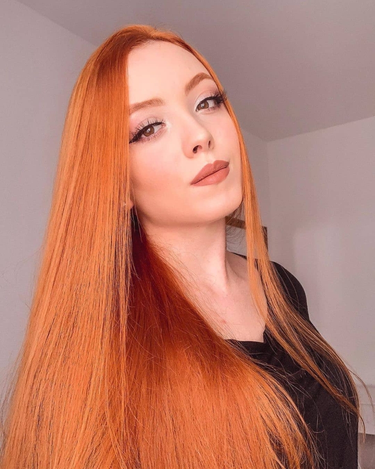 Cabelo ruivo com olhos castanhos