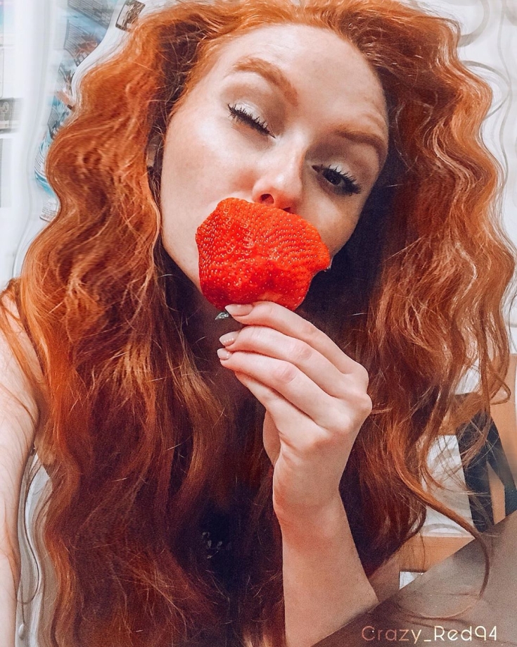 Cabelo ruivo com olhos castanhos