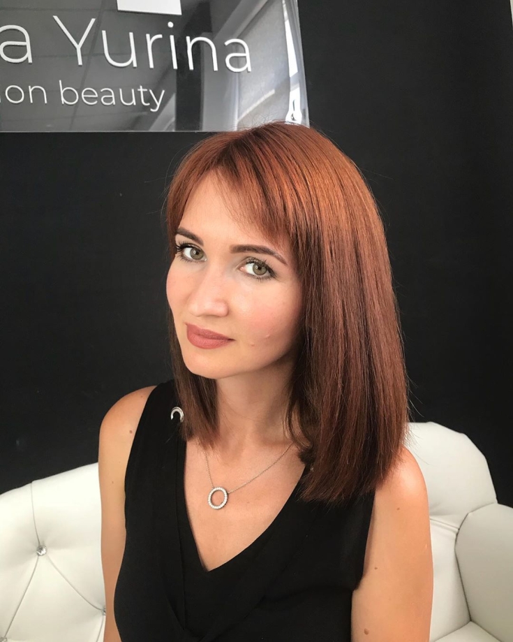 Cabelo ruivo com olhos castanhos